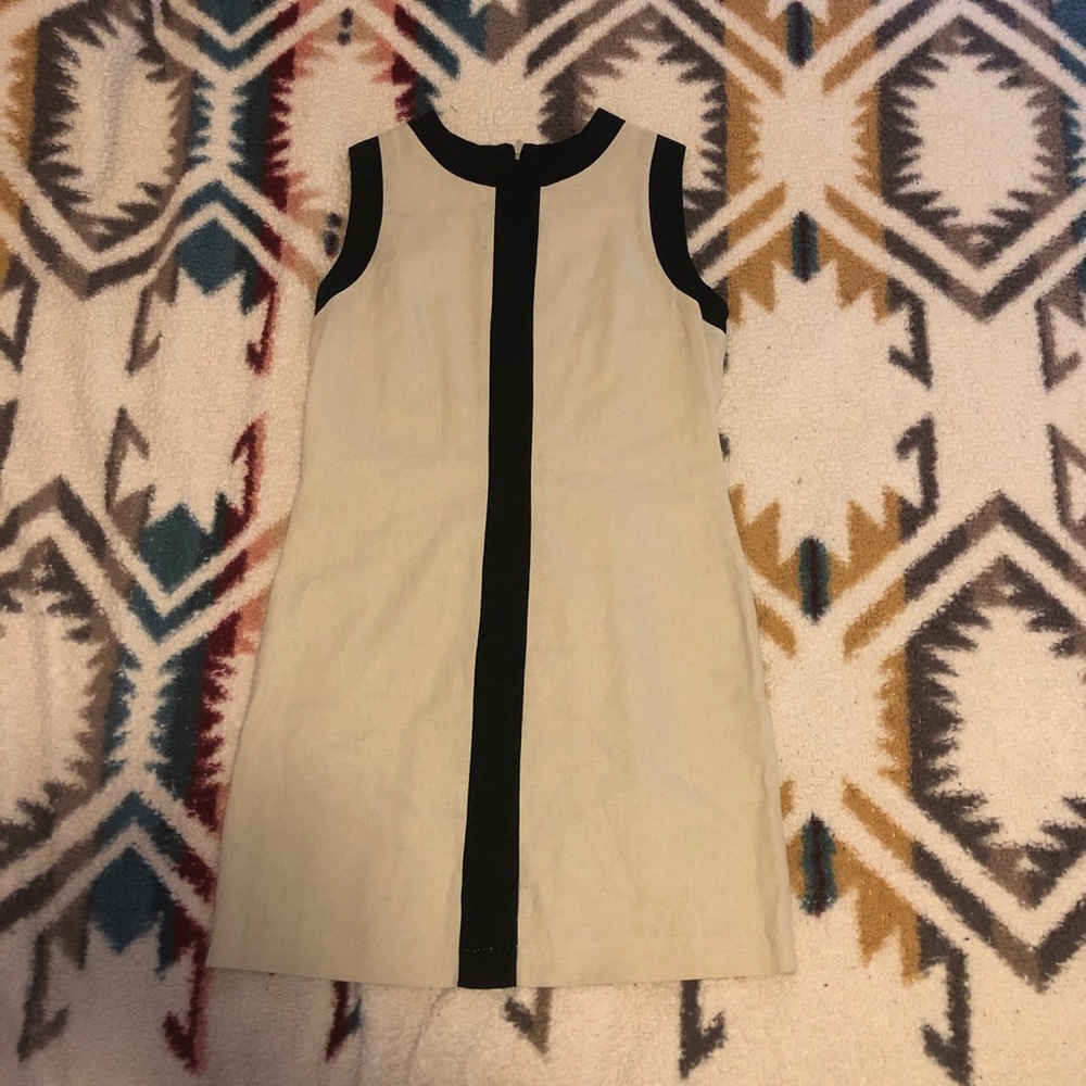 Cream dress with black outline, size medium